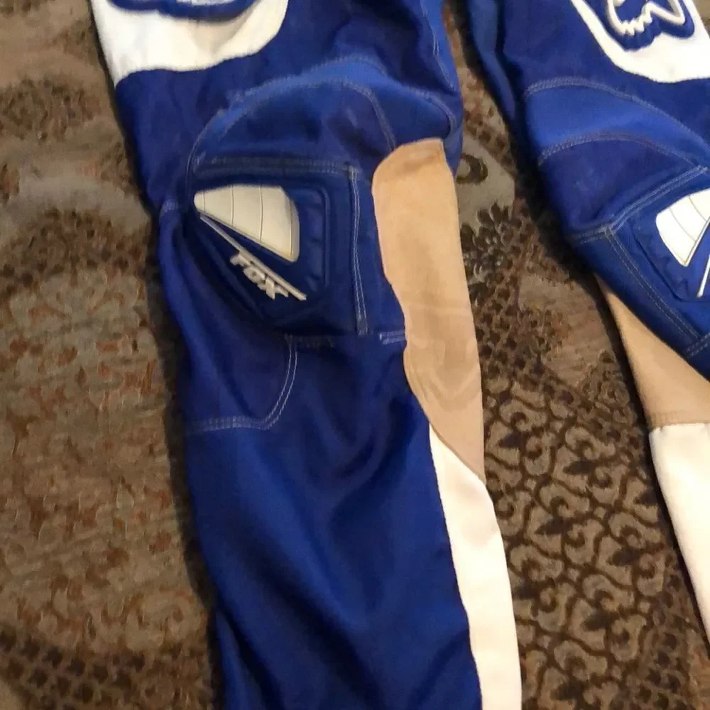 Fox Racing 180 size 30 motorcycle pants one tear